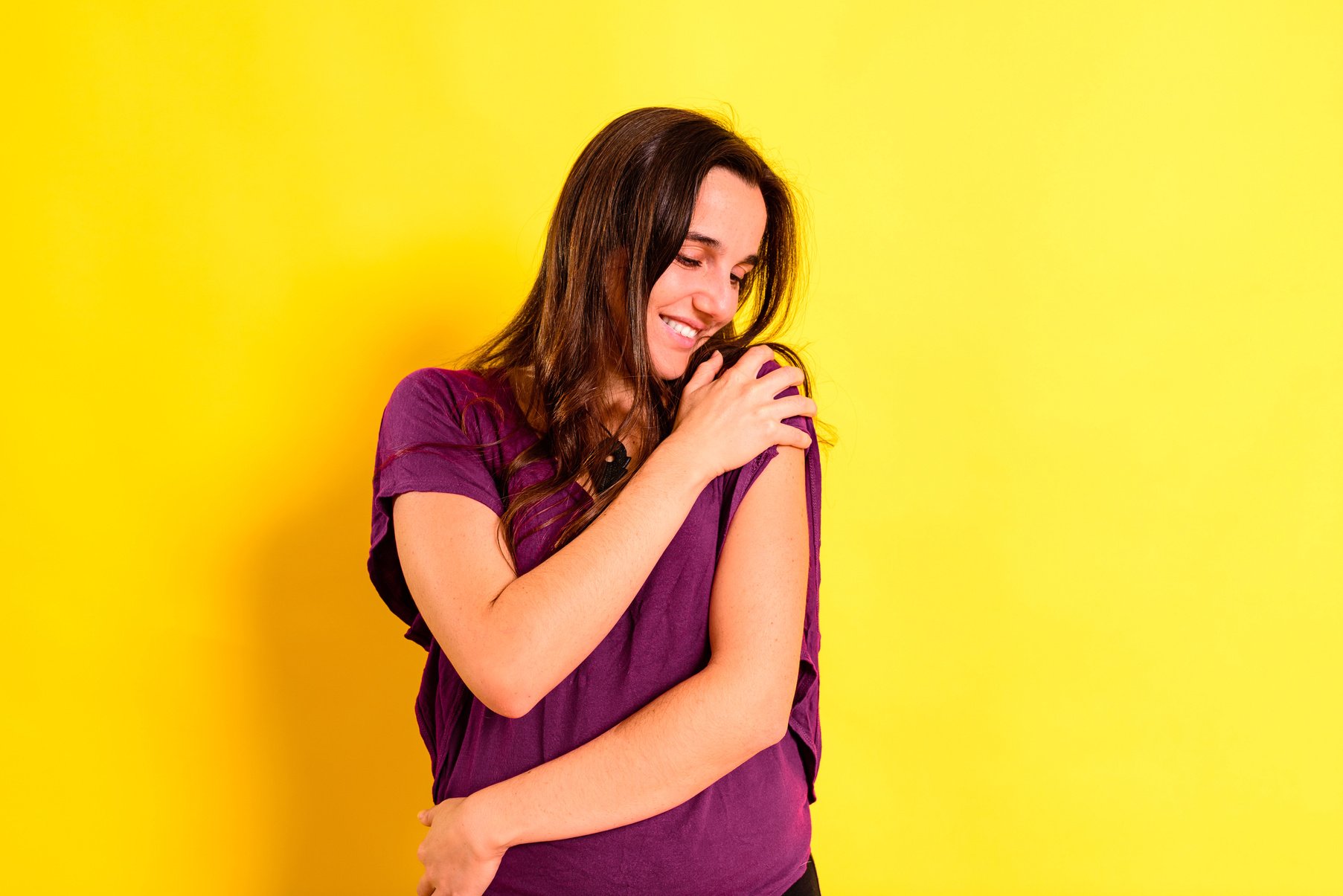 Woman Hugging Herself